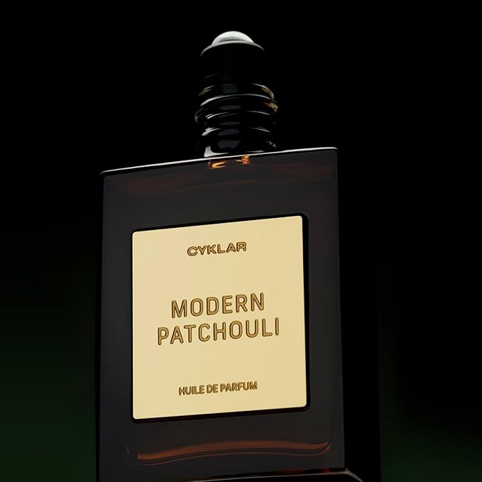 Perfume Oil Roll-On. Travel-Friendly Modern Patchouli Fragrance with Bergamot, Verbena, and Cashmere. Long-Lasting Essential Oil Parfum for Women and Men. 0.5 Fl Oz Scented Rollerball Bottle