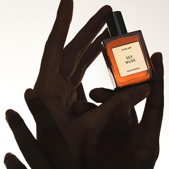 Perfume Oil Roll-On. Travel-Friendly Sex Musk Fragrance with Rose, Tonka Bean, and Musk Notes. Long-Lasting Essential Oil Parfum for Women and Men. 0.5 Fl Oz Scented Rollerball Bottle